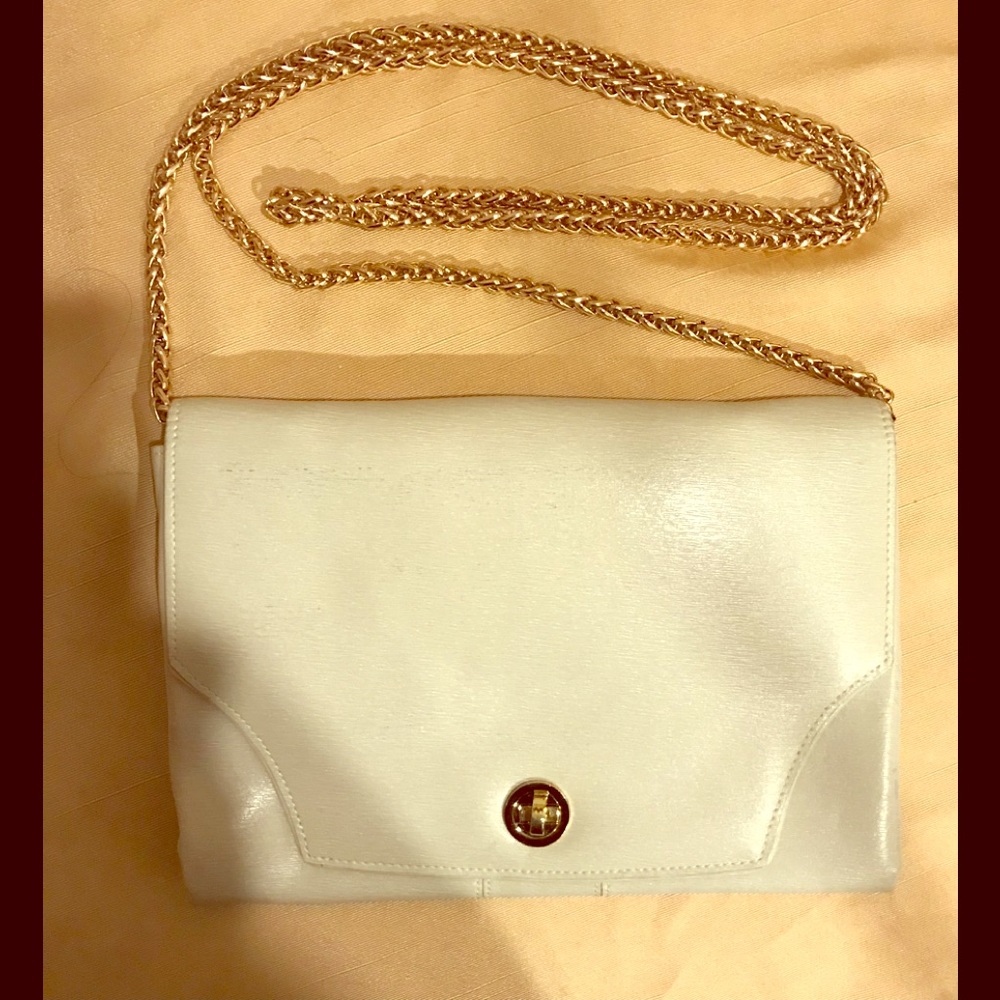 Tusk off white textures leather envelope clutch.